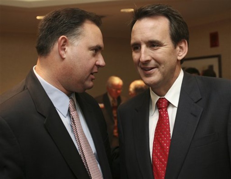 Gov. Tim Pawlenty, R-Minn., right talks with Republican congressional candidate Frank Guinta during a luncheon in Manchester, N.H., on Sept. 30.